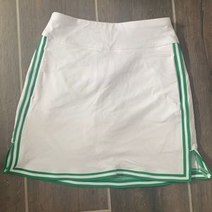 White tennis skirt with green stripes